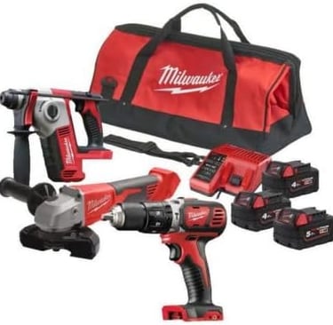 Milwaukee power tool combo kit including a drill, grinder, hammer drill, batteries, and red tool bag.