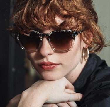 Woman wearing designer sunglasses
