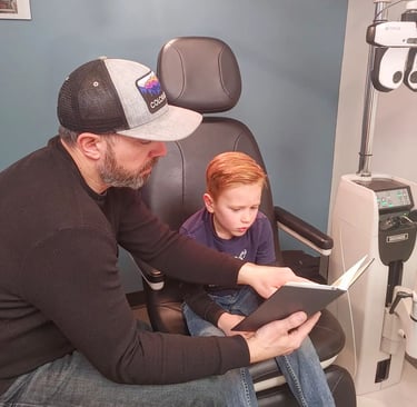 Kid's eye exam in the Fort Collins location, child receiving a vision test