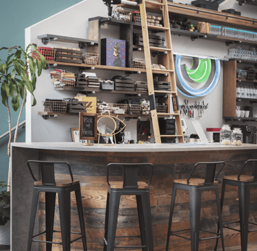 Interior view of Edge Optics Fort Collins location, with chairs and eyeglass repair tools