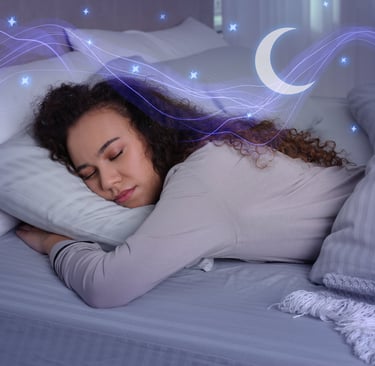 a woman is sleeping in a bed with a moon and stars floating over her
