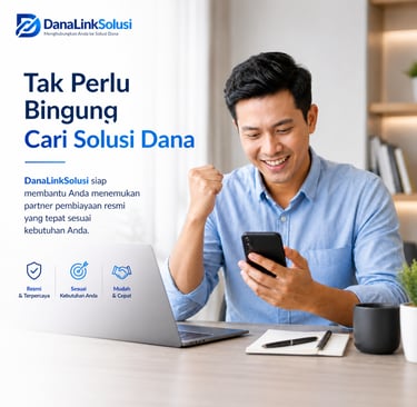 Smiling man using a smartphone and laptop for DanaLinkSolusi financial funding services.