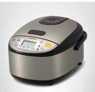 This rice cooker is a kitchen must-have! Perfect for cooking rice or keeping meals warm.
