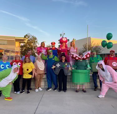 Magic center board of directors in costume regional tournament