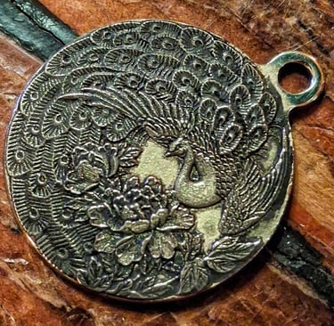 3 dimensional "3d relief" engraving of a peacock in brass