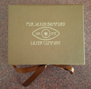 Twelve brass plaques packaged and ready for their new owner