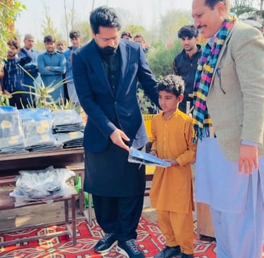 Saqib Khan Chadhar MPA PP-97 chiniot distuributing gifts among the primary school students in chinio