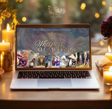 laptop screen with  Whispers of Wisdom, the Oracle Deck Creation Course on the screen
