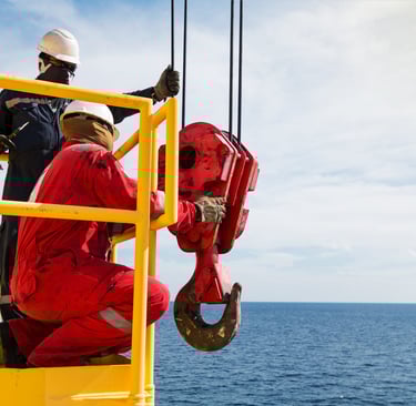 SLA inspector inspecting offshore crane hook and sheaves being inspected