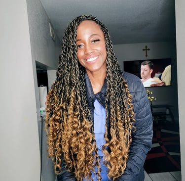 a woman with a long passion twist hairstyle