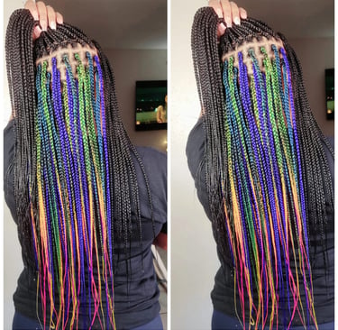 a woman with long colorful box braids