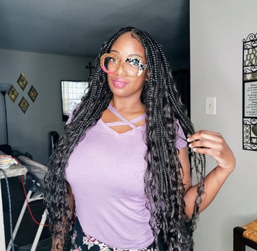 a woman with long goddess braids