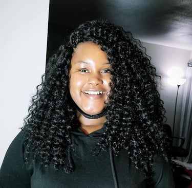 a woman with a crochet hairstyle