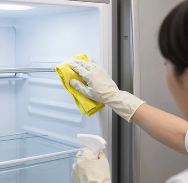 A pair of gloves sitting on top of a wooden floor