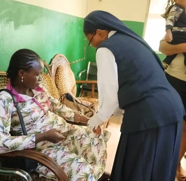 A catholic nun nurse providing medical care to a patient at a community health clinic.
