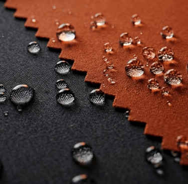 waterproof fabric comparison demonstrating water resistance on different textile surfaces