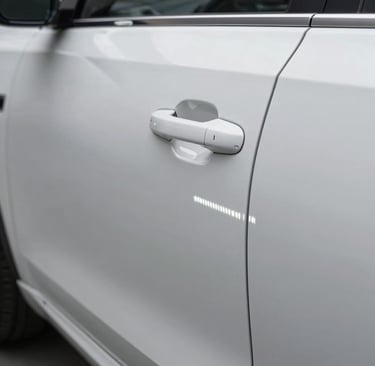 The 'After' shot of the same car door. The dent is completely gone, and the reflection of the PDR LED light is now perfectly straight and uniform. The original factory paint looks flawless and glossy, emphasizing professional quality and craftsmanship.