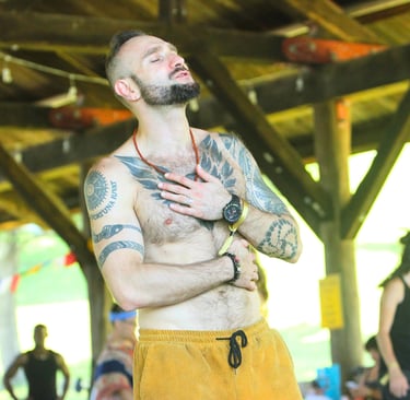 Feeling into the heart during the Higher Love Campout dances.