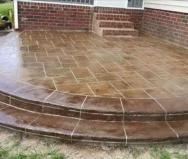 a patio with a brick patio with a brick patio