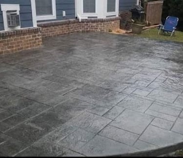 a patio with a patio with a concrete patio with a concrete patio with a concrete