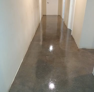 a hallway with a door leading to a hallway