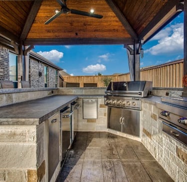 a kitchen with a ceiling fan and a ceiling fan