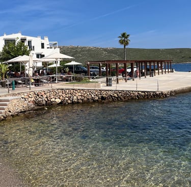 Royal Enfield motorcycle tour stoping at a restaurant in Menorca