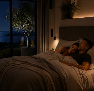 Couple en sommeil dans leur lit afin de favoriser une récupération parfaite dans une ambiance lifestyle premium