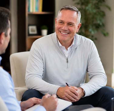 Doug in a meeting discussing customer experience.
