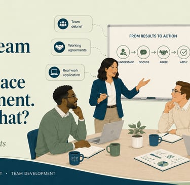 Professional team in a workplace assessment workshop discussing results to action strategy and team development.