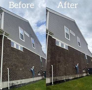 Before and after comparison of professional house soft washing on grey siding and dark brick exterior.