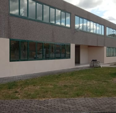 a building with a bench and a bench in front of it