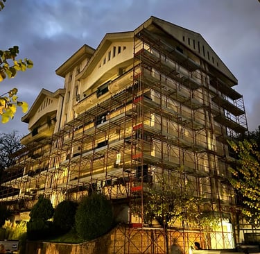 a building with scaffiered scaffolding on the side of it