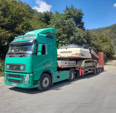 Hidromek ekskavatör ve yol yapım makineleri ağır yük taşımacılığı