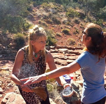Emily conducts our smudging ceremony at the medicine circle in Sedona's high desert