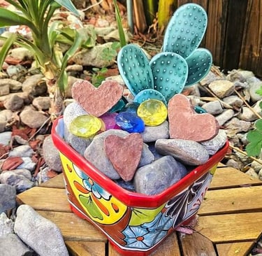 Heart-shaped rocks gifted by "Heart King" Robert Sechrengost at Sedona's Boynton Canyon vortex site