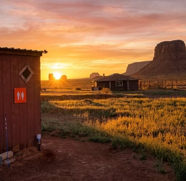 You can even see Monument Valley's iconic formations along the path to the Hogan's outhouse!!