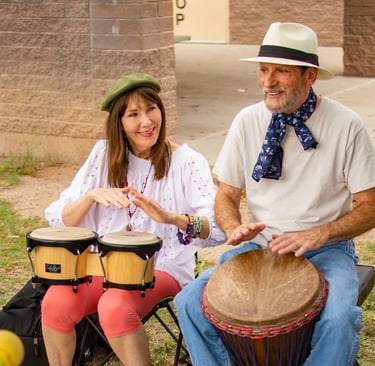 Jerry and Victoria drumming with heart at Himmel Park Drum Circle in Tucson, Arizona