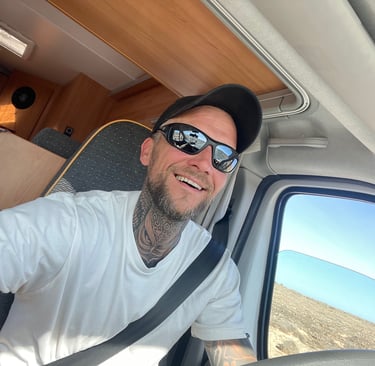 seamusthefreenomad happy in camper van