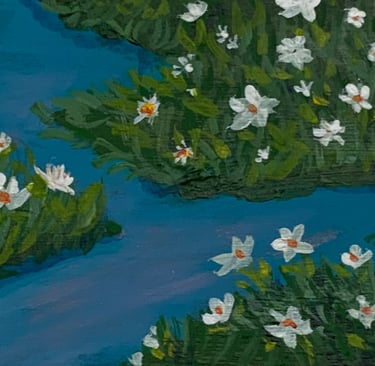 blue waters, green lush plants, white flowers