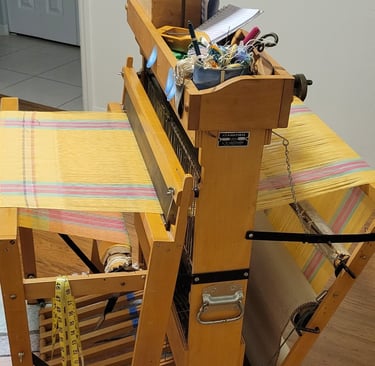 Golden yellow table runner on the loom.
