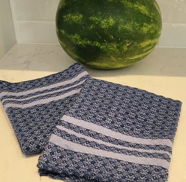 Blue and grey hand-woven towels.