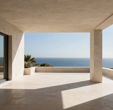 Wide shot of a minimalist luxury villa terrace overlooking the Mediterranean, crisp natural sunlight, sharp architectural shadows, champagne and charcoal tones