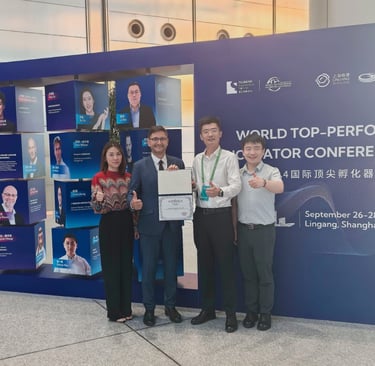 Award winners posing with a certificate at the 2024 World Top-Performing Incubator Conference in Shanghai.
