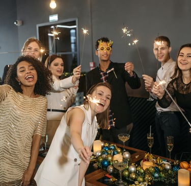 smiling partygoers at a holiday party