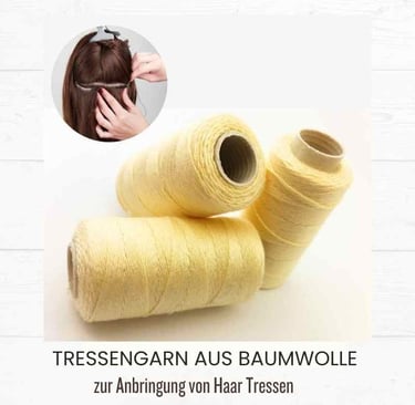 Yellow cotton weaving thread spools for professional hair extension weft application.