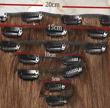 Set of brown clip-in hair extensions showing different weft widths from 5cm to 20cm.