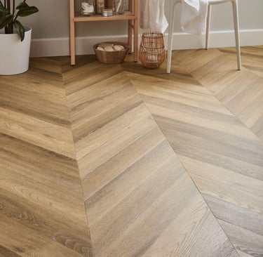 Modern bathroom featuring light oak chevron patterned luxury vinyl 