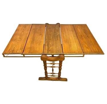 Antique convertible bookcase turns into antique convertible, dining table