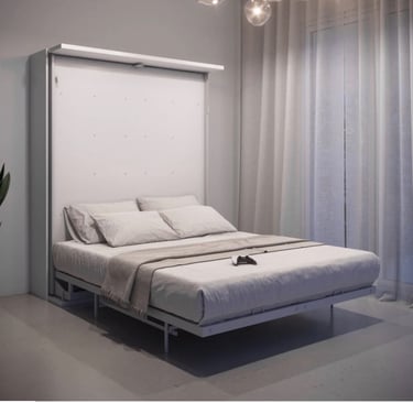 This Murphy bed rotates and turns into a bookshelf with converting desk